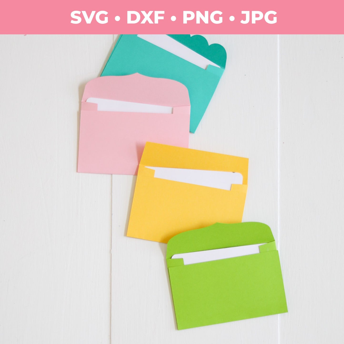 Three colorful paper envelopes (pink, yellow, green) with white cards on a light background.