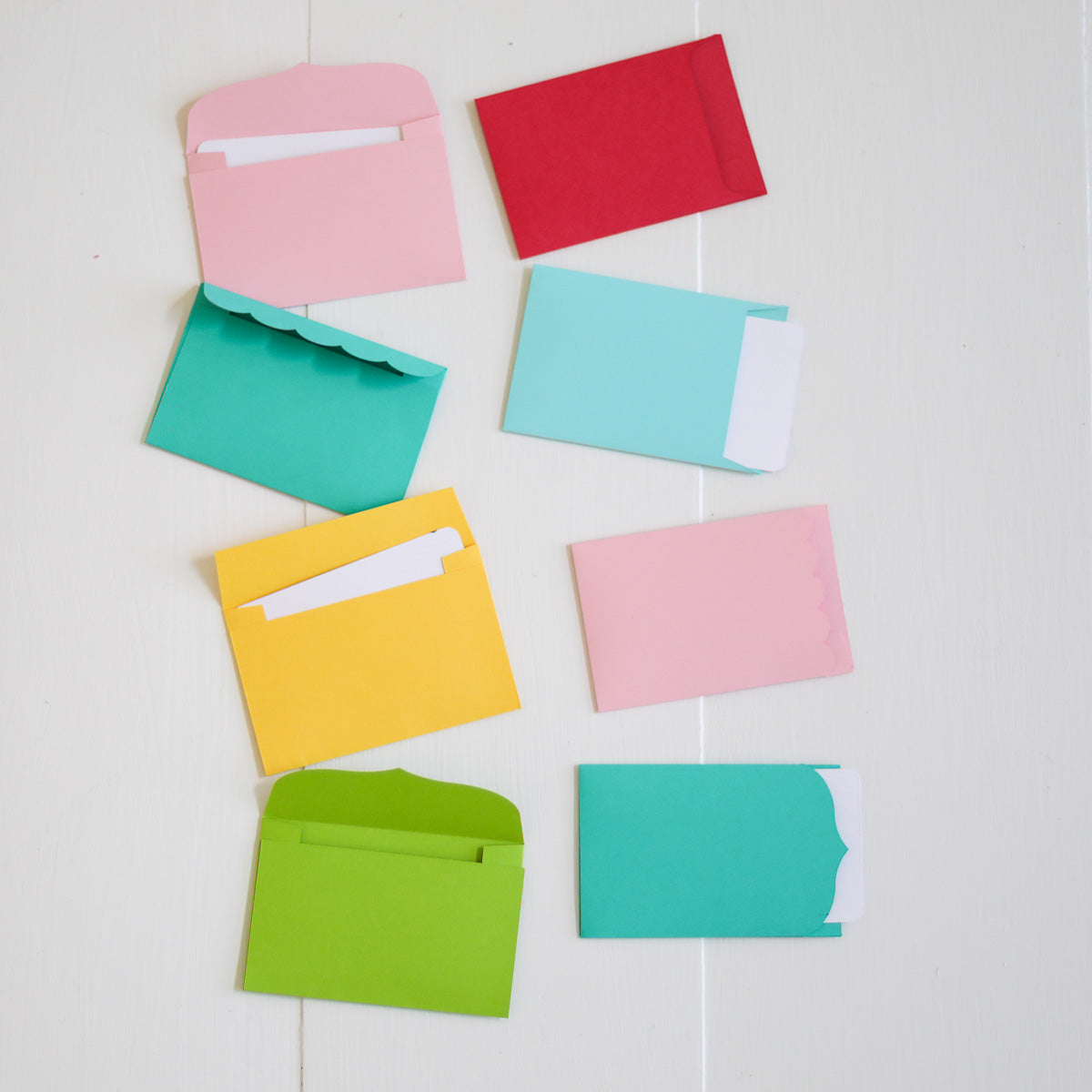 Colorful envelopes and postcards on a white background