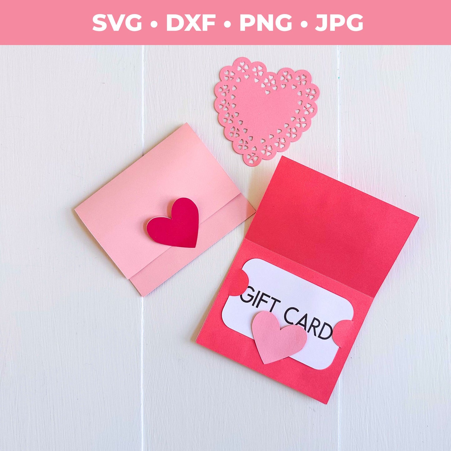 Pink gift card holder with heart shapes on a white background