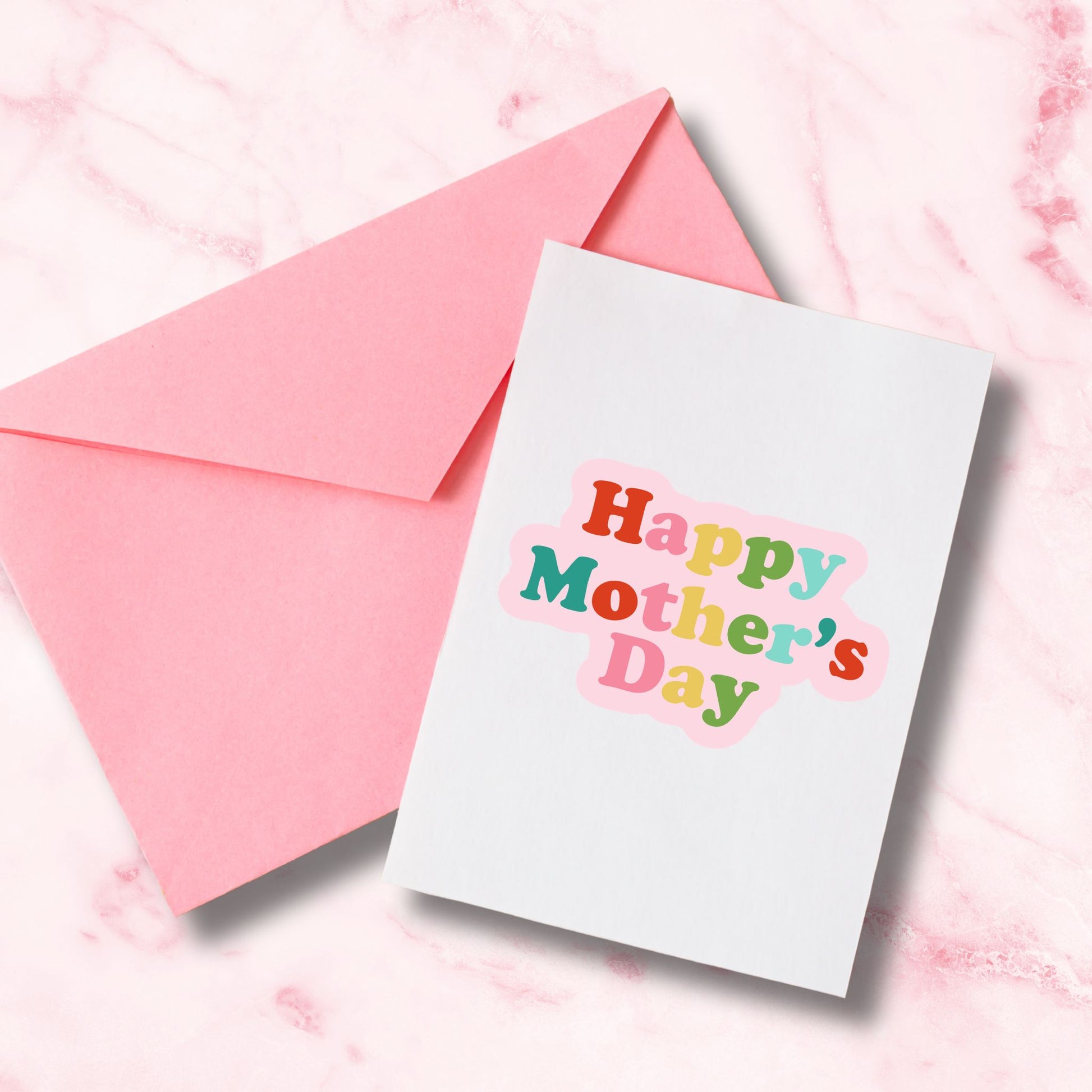 Greeting card with 'Happy Mother's Day' text and pink envelope on a pink marble background